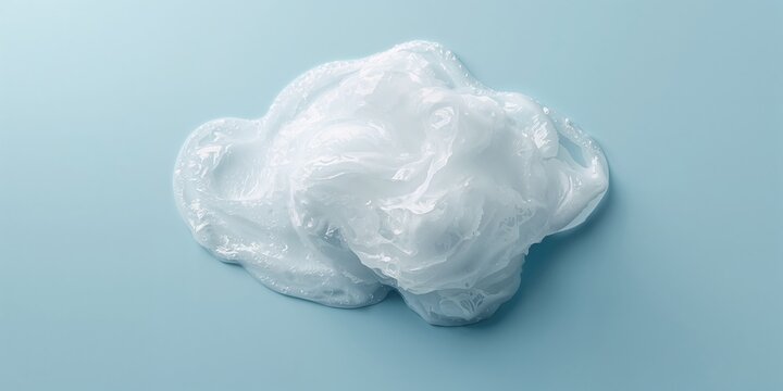 Light blue background with fluffy bath foam, suitable for spa or skincare product layout - Powered by Adobe