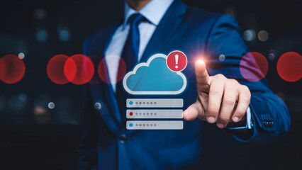 Businessman interacting with cloud storage warning notification