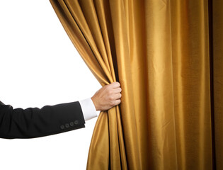 A man's hand in a formal suit opening a gold velvet stage curtain isolated on a white or transparent background.