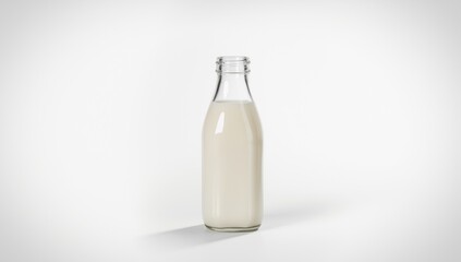 Glass bottle filled with milk placed on a kitchen countertop, highlighting eco-friendly container options