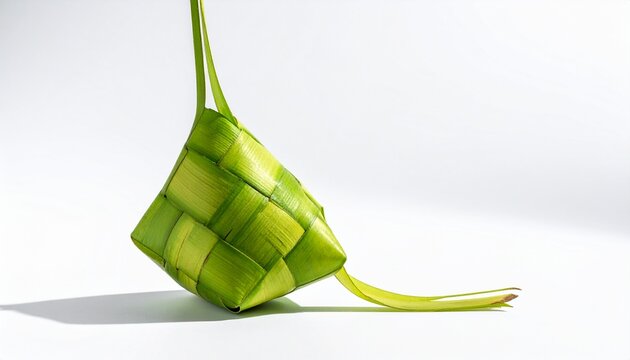 Traditional green ketupat palm leaf woven basket