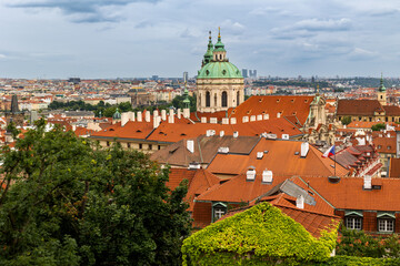 Fototapeta premium Aerial view of roofs of Prague from the Castle garden, the Czech Republic