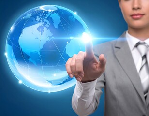 Woman interacts with a bright blue globe on a solid blue background