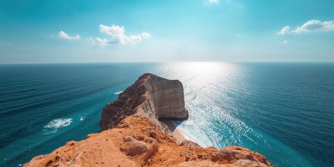 A high-angle perspective of the Libyan Sea with sandstone cliffs near a village, highlighting coastal erosion, Earth Day