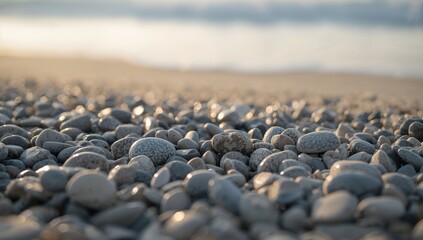 Beach recreation scene featuring smooth pebble stones as a calming background for holiday content, emphasizing relaxation