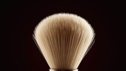 Macro photograph of shaving brush bristles on a dark surface, highlighting grooming equipment for daily routine