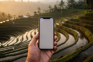Smartphone foreground, rice terraces behind