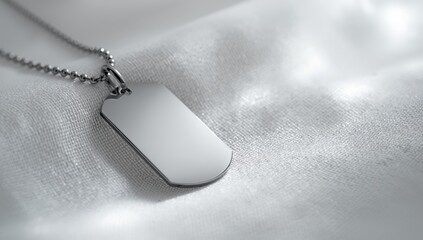 Fototapeta premium Silver metal identification tag on a chain, designed for pet recognition, background for security labeling
