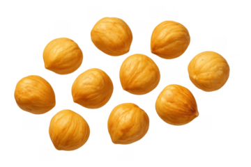 Hazelnuts kernels falling and scattering on transparent background