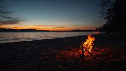Beach scene with a campfire during sunset, ideal for nighttime gatherings