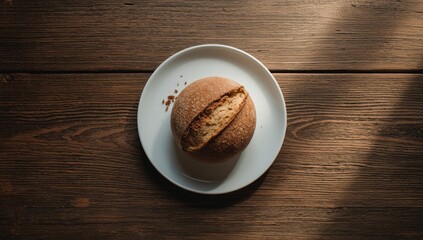 White bread and cake arranged on a plate for a bakery display, breakfast setting