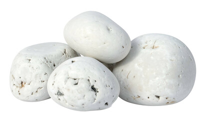 A close-up of smooth, white river rocks piled together, isolated on black