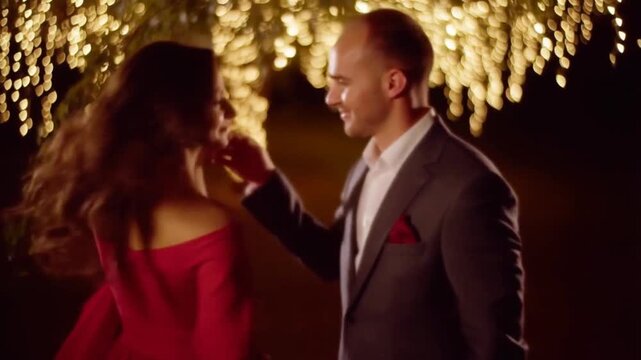 Couple Dancing Under Fairy Lights