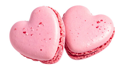 Two heart-shaped pink pastries, possibly macarons, arranged on black, cut out background