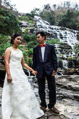 Portrait Wedding on huge Mae Ya waterfall Wedding in Asia