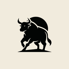 Bold silhouette of a bull with horns in dynamic stance on light background