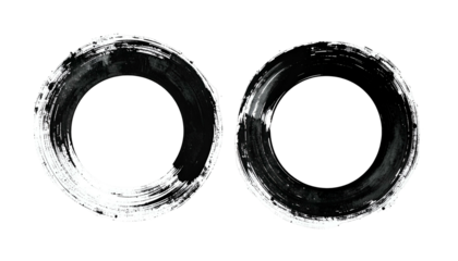 Two abstract circular brushstroke designs in black and white against a black backdrop