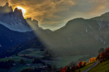 Beautiful sunrise with clouds in mountains. Mountain sunrise landscaoe. Sunrise in mountains. Sunrise sky at dawn over mountain peaks