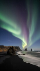 Night sky over a black sand beach, with vibrant aurora borealis