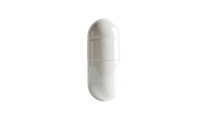 Isolated, close-up shot of a white capsule against a stark black background