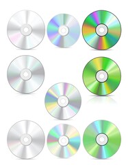 Nine compact discs arranged in rows against a white backdrop