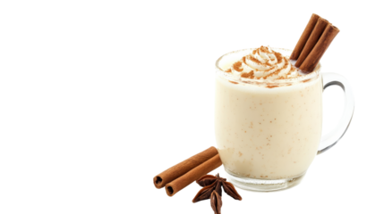 A glass of milk with cinnamon sticks on top