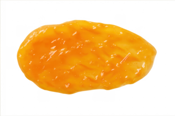 Orange jam blob dropping creating a glossy texture