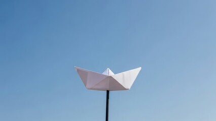 Paper Boat Voyage Dreams Sail on a Sunny Sky.