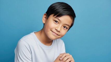 Smiling boy on blue background