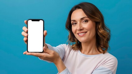Woman holding smartphone with blank screen