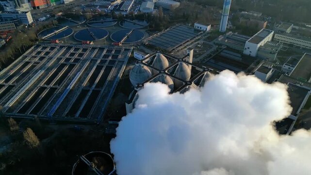 sewage treatment plant industrial emitting smoke. Great aerial view drone