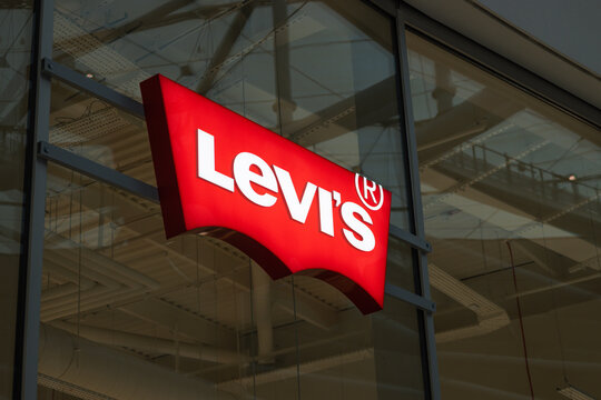 Levi's Store Logo Red Sign on Glass Facade. London, UK, 17 February 2024