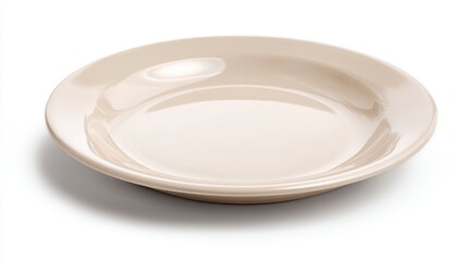 A round plate sits on a flat surface in a kitchen or dining area. The plate is beige and empty waiting for food to be placed on it. Soft light from a window fills the area.