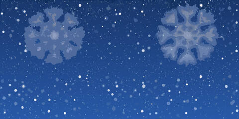 Two detailed snowflakes drift against a softly speckled navy background © Ranajit