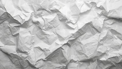 Fototapeta premium Detailed view of wrinkled white paper surface suitable for editorial header backgrounds or UI backdrops, textured material