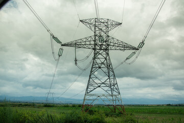  high-voltage electrical transmission tower (also known as a power pylon). These tall structures, typically made of steel lattice, support overhead power lines.July 2021, Romania