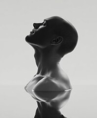 Person with shaved head emerging from water reflected on a smooth surface in monochrome tones