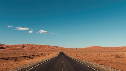 Clear blue sky above desert dunes, suitable for background in geographic or environmental layouts, Earth Day