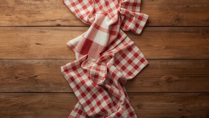 Fototapeta premium Kitchen towel or napkin on a weathered wooden surface, designed for editorial header use