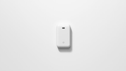 External battery pack with charging cable designed for mobile devices, placed on a clean white surface