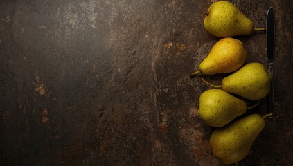 Fresh organic pears displayed on a dark stone background emphasizing natural food presentation, food, summer, vintage, table, concept
