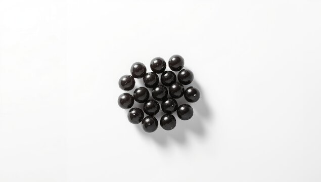 Black tapioca pearls used in bubble tea, emphasizing chewy texture and ingredient composition