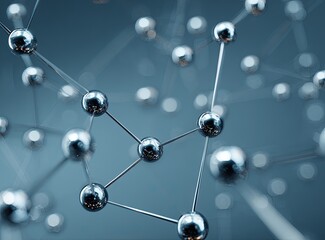 Networked chrome spheres connected by thin lines against a blurry background