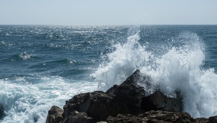 Wild waves colliding with rocky shoreline in Sicily, emphasizing natural erosion processes