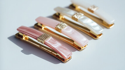 Women's hair clips are hair accessories with shiny and matte textures isolated on a white background.