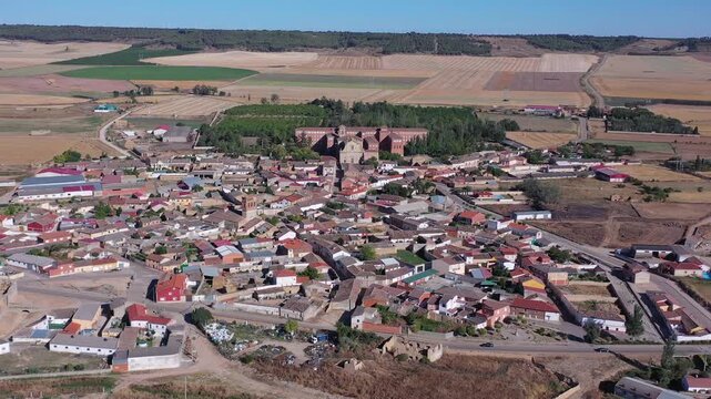 Drone Aerial View of Villagarc&iacute;a de Campos Rural Village and Agricultural Fields in Valladolid, Spain