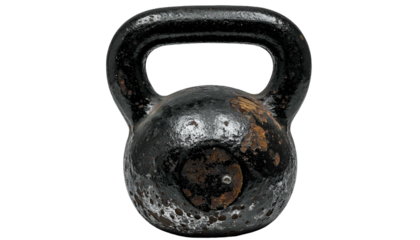 Close-up of a well-worn, cast-iron fitness tool on a black background