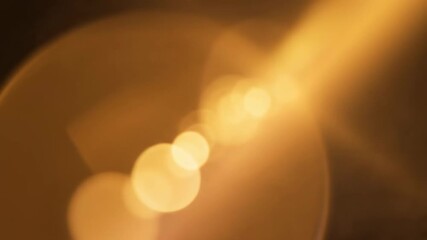 Warm and organic cinematic light leaks sweeping across the screen with gentle movement and soft golden bokeh flares warm organic cinematic light leaks, wallpaper, illumination