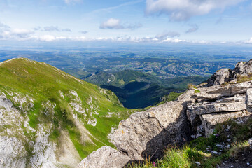 Fototapeta premium Steep Limestone Cliffs and Mountain Panorama