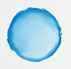 Blue watercolor circle with darker edges on white paper, simple abstract